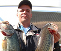 Professional fishermen fishing from the Bass Tub