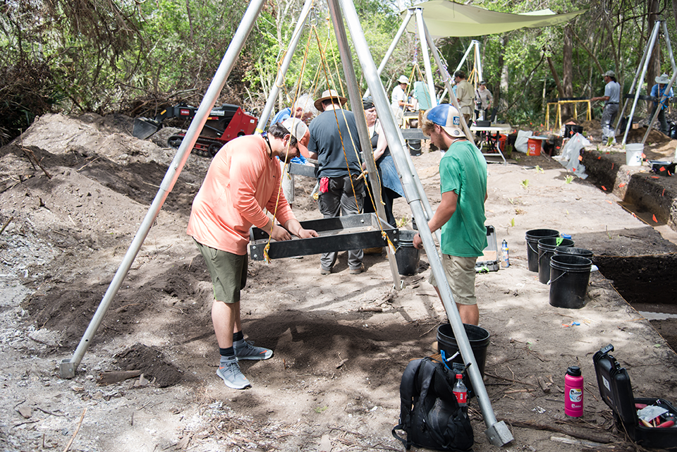 The SCDNR building with many people standing in front of it.