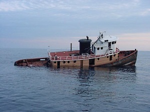 Partially Submerged Tugboat