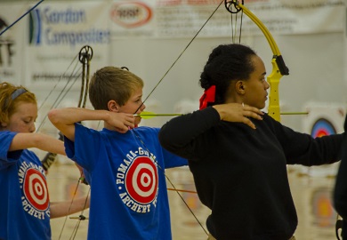Student archers from Pomaria Middle School in S.C. (blue shirts) along with fellow competitors from other states, show their intensity at the NASP World Tournament in Myrtle Beach. photo by David Lucas, SCDNR Student archers from Pomaria Middle School in S.C. (blue shirts) along with fellow competitors from other states, show their intensity at the NASP World Tournament in Myrtle Beach. photo by David Lucas, SCDNR