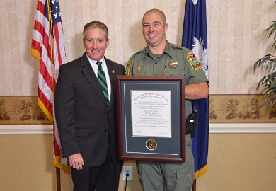 Officer Wes Stewart of Lancaster (right) was named the SCDNR Law Enforcement Officer of the Year for the second year in a row. He is shown with State Sen. Greg Hembree of Little River, a member of the Senate Agriculture and Natural Resources Committee. Hembree was the keynote speaker at the Sept. 23 Officer of the Year Banquet in Columbia. (SCDNR photo by Greg Lucas)