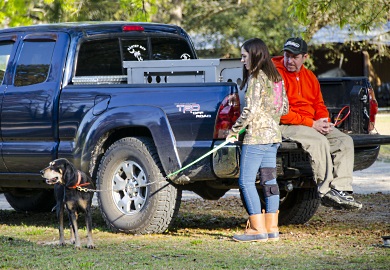 A young competitor and her hound wait for the start of the 2017 State Championship Youth Coon Hunt at the SCDNR's Webb Wiuldlife Center. This year's championship will be held March 3, 2018. A young competitor and her hound wait for the start of the 2017 State Championship Youth Coon Hunt at the SCDNR's Webb Wiuldlife Center. This year's championship will be held March 3, 2018.