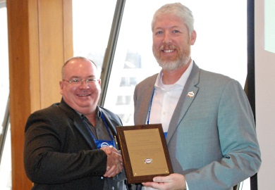 SCDNR's Scott Meister (right) accepts the 2017 State Program Excellence Award from States Organization for Boating Access president Ron Christofferson. SCDNR's Scott Meister (right) accepts the 2017 State Program Excellence Award from States Organization for Boating Access president Ron Christofferson.