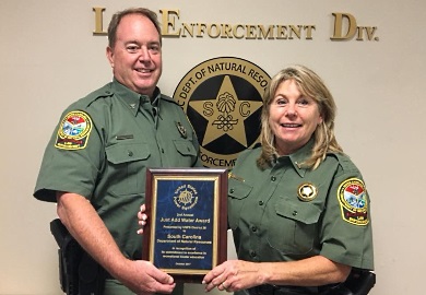 Lt. Kim Leverich receiving an award at the 2nd Annual Just Add Water Awards.