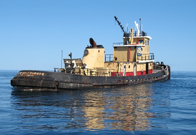 The Gen. Oglethorpe, a retired tugboat, rests on calm seas just before sinking. (Photo: Robert Martore/SCDNR) The Gen. Oglethorpe, a retired tugboat, rests on calm seas just before sinking. (Photo: Robert Martore/SCDNR)