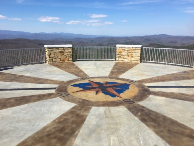 The compass rose etched into the Sassafras Mountain Tower shows the South Carolina-North Carolina state line running through the structure. (SCDNR photo by Danielle Kent)