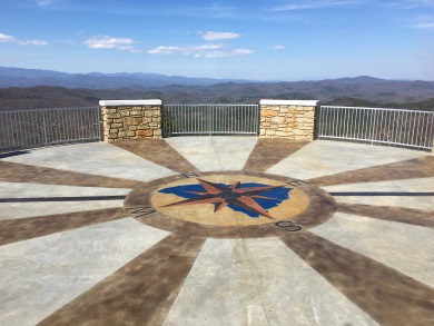 The compass rose etched into the Sassafras Mountain Tower shows the South Carolina-North Carolina state line running through the structure. (SCDNR photo by Danielle Kent) The compass rose etched into the Sassafras Mountain Tower shows the South Carolina-North Carolina state line running through the structure. (SCDNR photo by Danielle Kent)