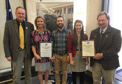 SCDNR staff receiving 'Notable State Document' awards for 2016 pose for a photograph, March 17, 2017 at the State Library in Columbia. From left to right: SCDNR Director Alvin Taylor, State Climatologist Hope Mizzell, GIS manager Tanner Arrington, Marine Division Science Writer Erin Weeks and Public Information Coordinator David Lucas. SCDNR photo by Greg Lucas SCDNR staff receiving 'Notable State Document' awards for 2016 pose for a photograph, March 17, 2017 at the State Library in Columbia. From left to right: SCDNR Director Alvin Taylor, State Climatologist Hope Mizzell, GIS manager Tanner Arrington, Marine Division Science Writer Erin Weeks and Public Information Coordinator David Lucas. SCDNR photo by Greg Lucas