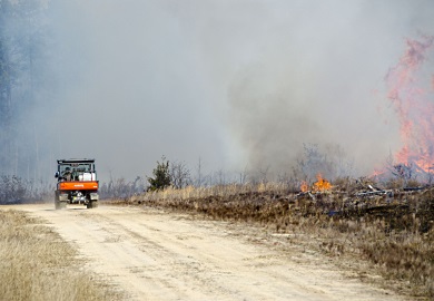 S.C. Department of Natural Resources technicians use an ATV to oversee a prescribed fire at the James Webb Wildlife Center in February 2017. SCDNR photo by D. Lucas