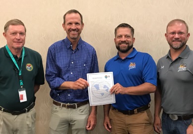 Breck Carmichael of SCDNR, Bill Palmer of Tall Timbers, Tim Caughran of Quail Forever, and Andy Edwards of Quail Forever are working together for the conservation of bobwhite quail. 