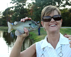 Women displaying her catch