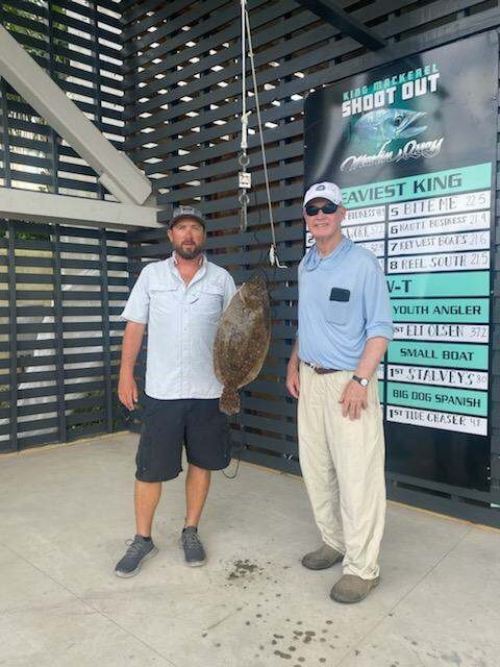 J.Fairey of Columbia, SC South Carolina's record Gulf Flounder stading with someone else
