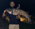 Robbie Rish and 35 pound Blue catfish caught July 26, 2014, Rediversion Canal