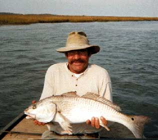 Fisherman showing catch