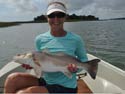 Donna Potzauf with a 26-inch red drum tagged and released.