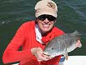 Angler with a tagged fish.