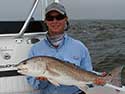 Angler with a tagged fish.